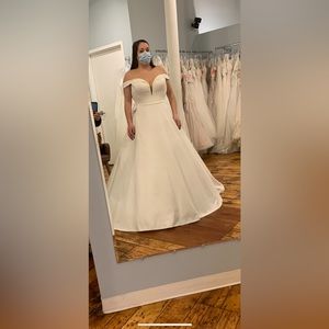 Brand new never worn, never altered wedding dress